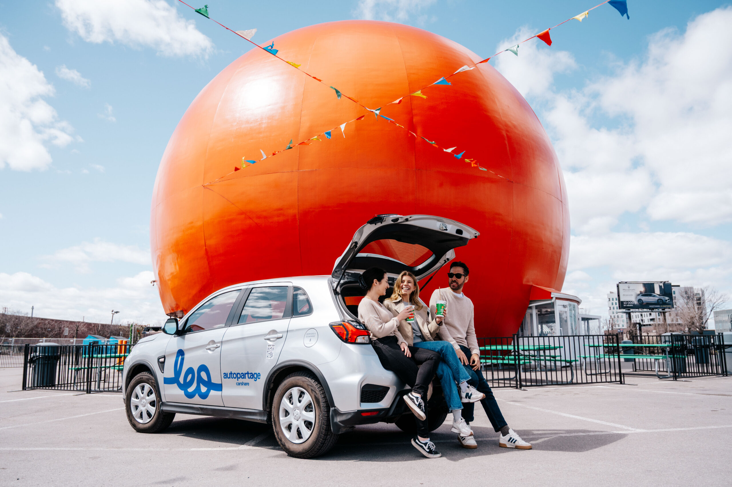 Leo and Go carsharing vehicles parked in designated street parking zone during city regulations